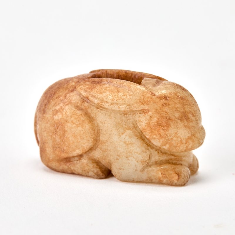 A Chinese Russet and Pale Celadon Jade Toggle