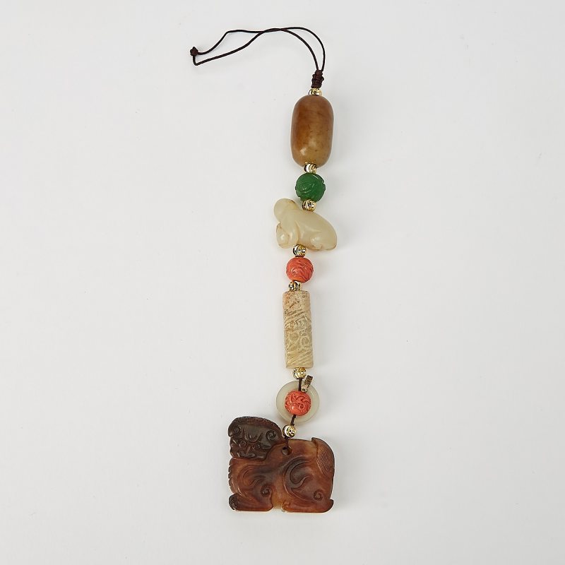 A Chinese String of Jade and Coral Pendants