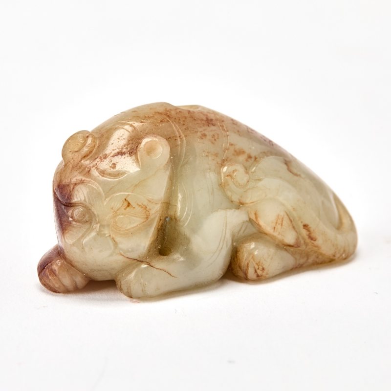 A Chinese Celadon Jade Toggle of a Tiger