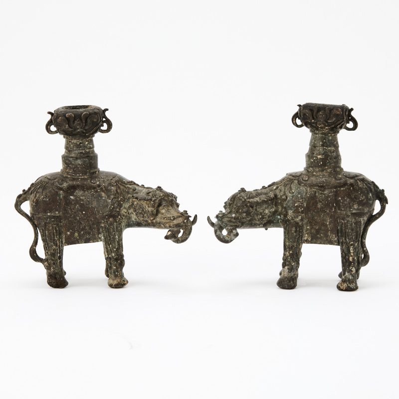 A Pair of Chinese Bronze Elephant Candle Holders