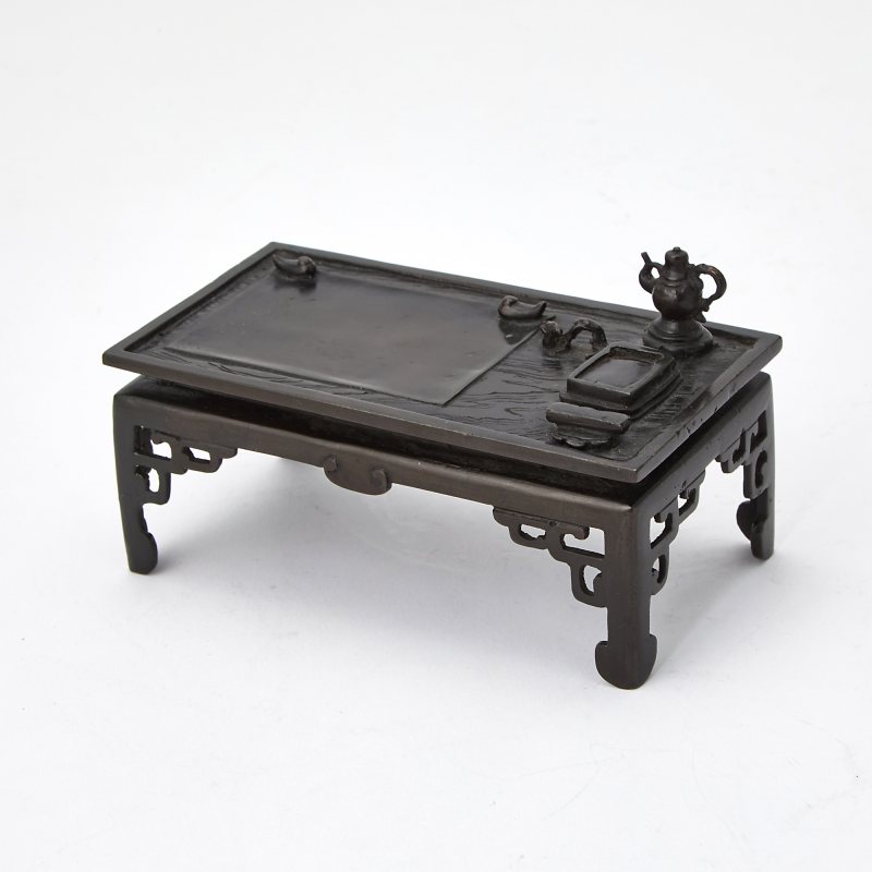 A Chinese Bronze Table-Form Inkstone