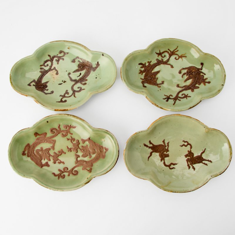 A Set of Four Chinese Celadon Glazed Ceramic Dishes