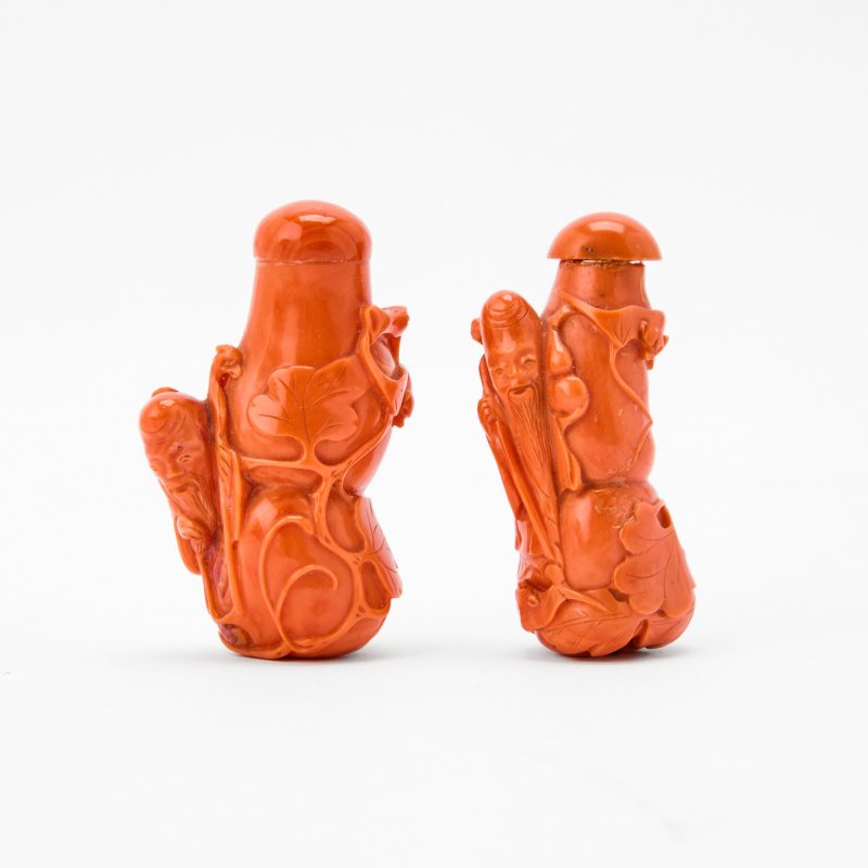 A Pair of Chinese Carved Coral Snuff Bottles