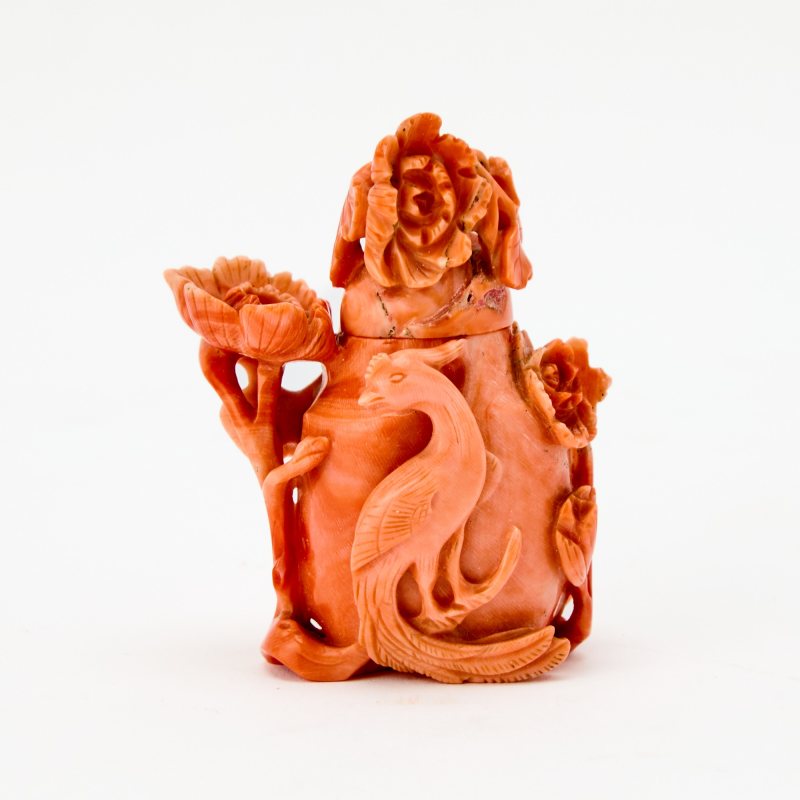 A Chinese Carved Coral Snuff Bottle