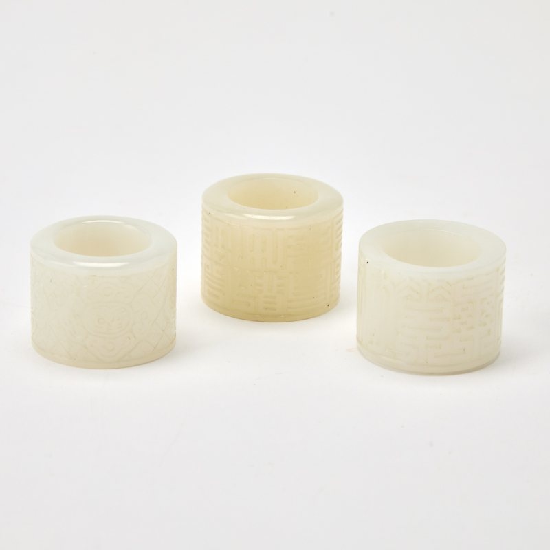 Three Chinese Carved Jade Thumb Rings