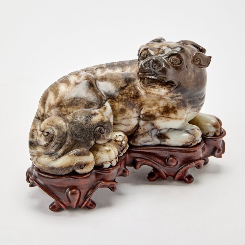 A Chinese Carved Mottled Jade Beast