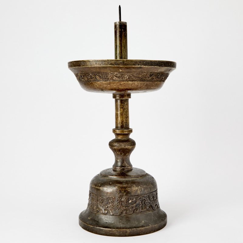 A Large Chinese Cast Bronze Temple Candle Holder
