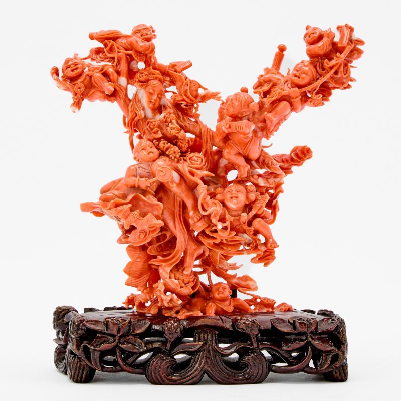 A Chinese Coral Carving of a Figural Group