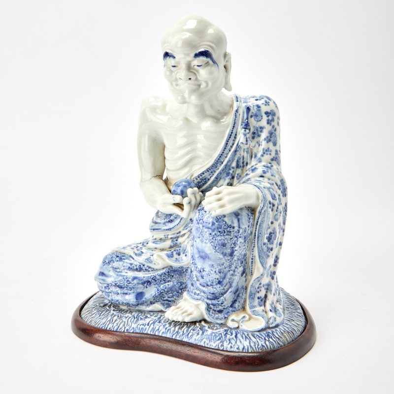 A Chinese Blue and White Porcelain Figure of a Luohan