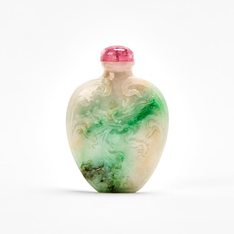 A Chinese Carved Jadeite Snuff Bottle