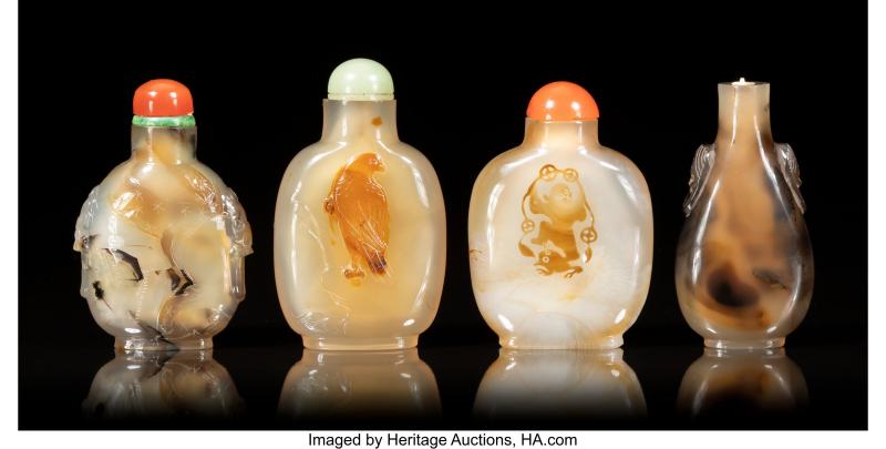 A Group of Four Chinese Carved Agate Snuff Bottles