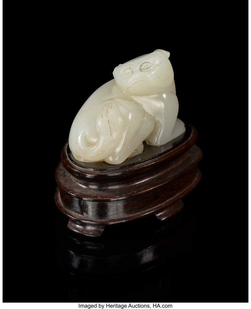 A Chinese Carved Russet Pale Celadon Jade Figure of a Recumbent Animal - 图2