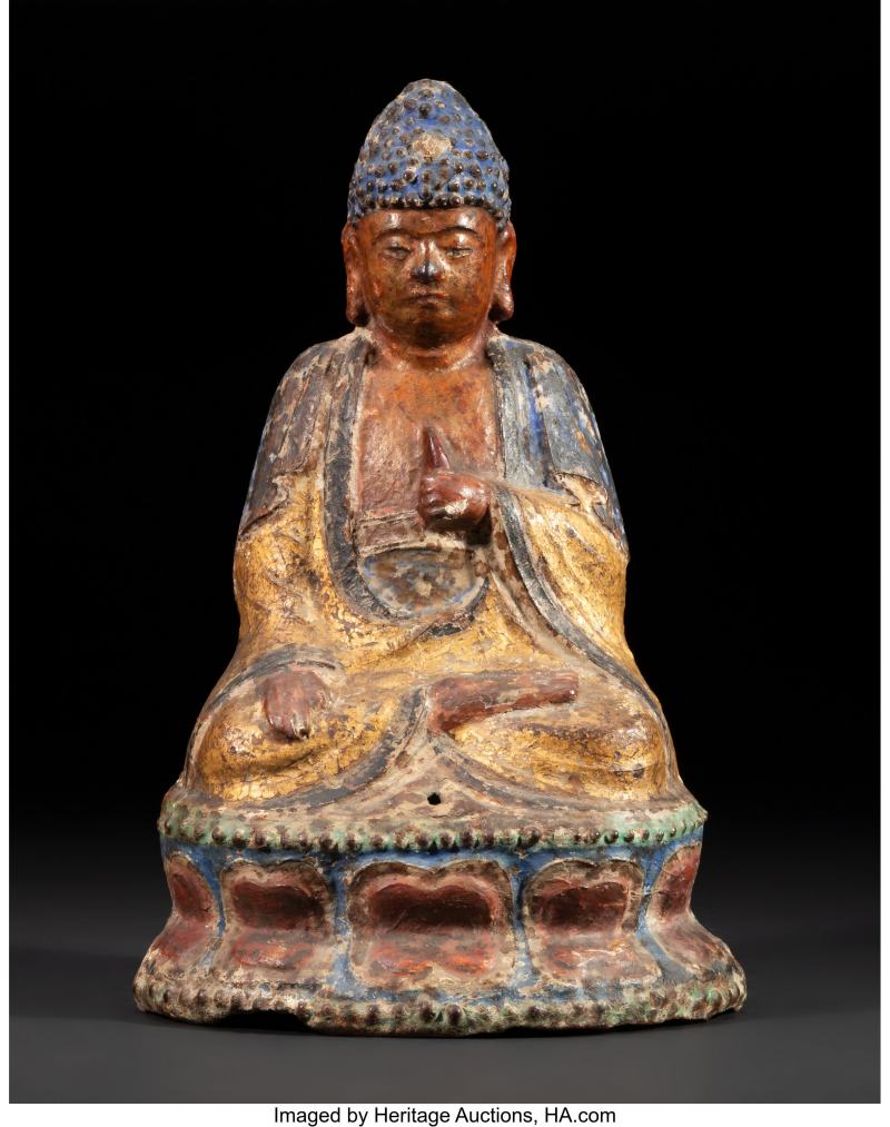 A Chinese Gilt and Polychrome Cast Iron Seated Buddha