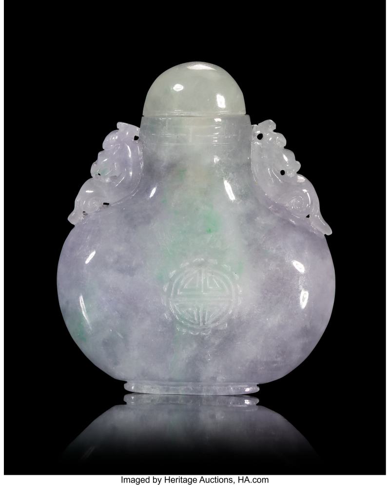 A Chinese Carved Lavender Jadeite Snuff Bottle