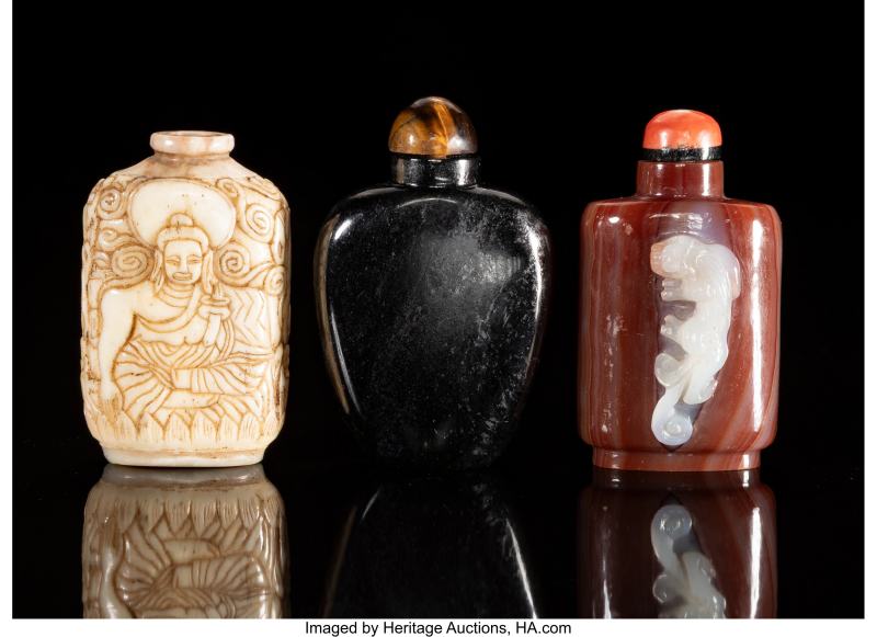 A Group of Three Chinese Hardstone Snuff Bottles