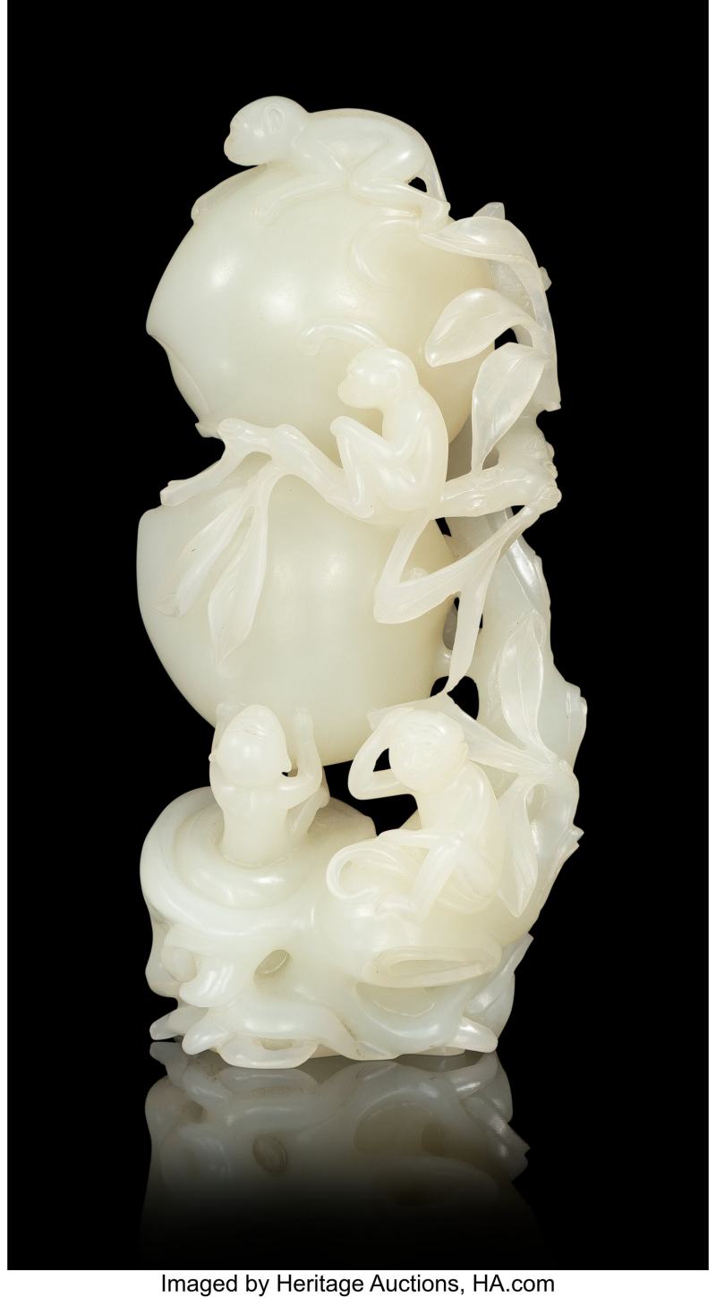 A Chinese Carved Pale Celadon Jade Peaches and Monkeys
