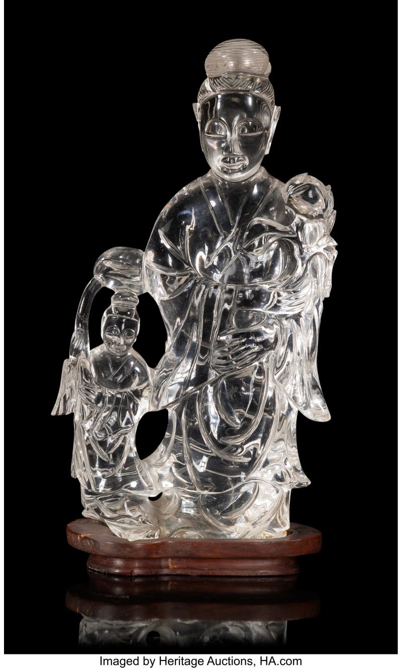 A Chinese Carved Rock Crystal Guanyin and Attendant