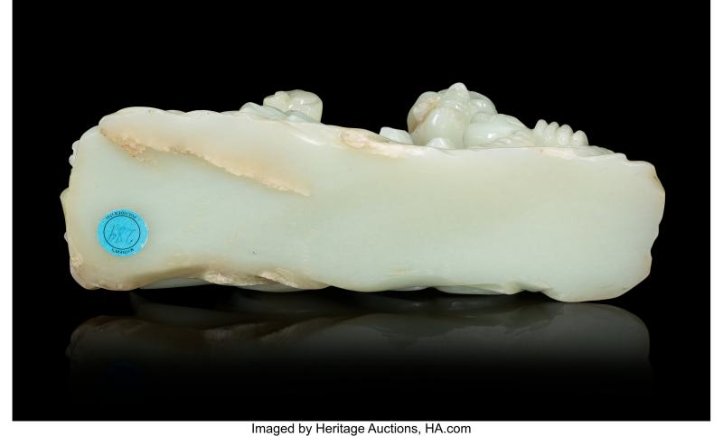 A Chinese Carved Pale Celadon Jade Reclining Figure of Luohan - 图4
