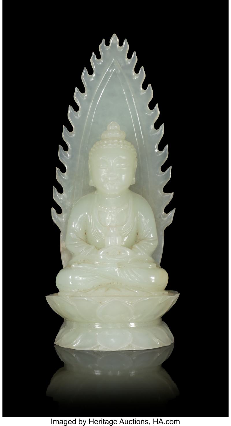 A Chinese Carved Pale Celadon Jade Figure of a Seated Buddha