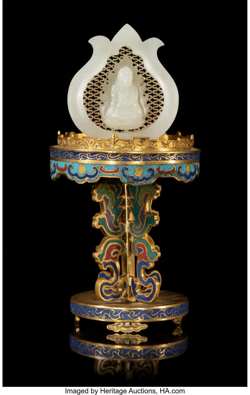 A Chinese Carved White Jade Buddha on Cloisonné Stand
