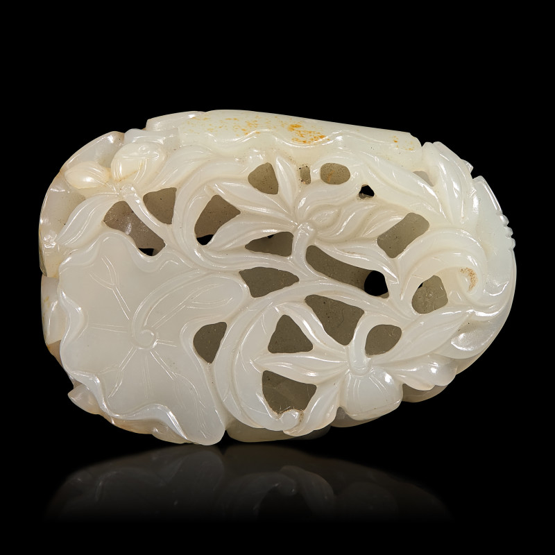 清中期 白玉帶皮鏤雕蓮塘荷葉佩 | A Chinese White and Russet Jade 'Lotus' Pendant, 18th/19th Century