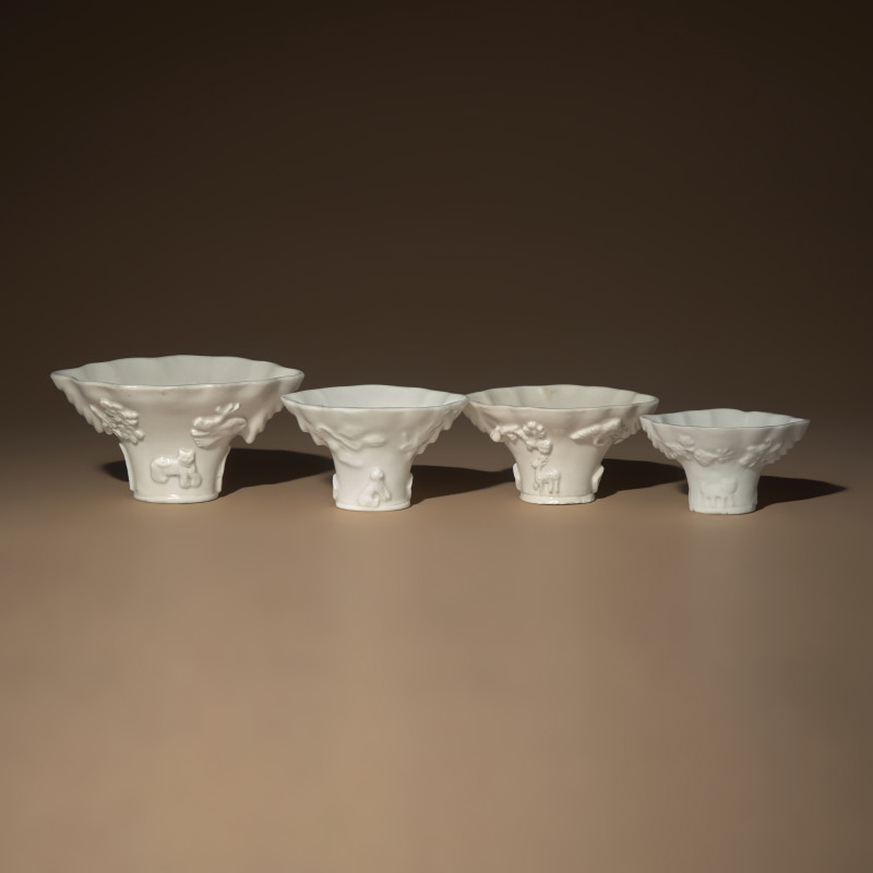 清中期 德化白瓷瑞獸靈芝杯四件 | Four Chinese Blanc-de-Chine Porcelain Libation Cups, 18th Century - 图1