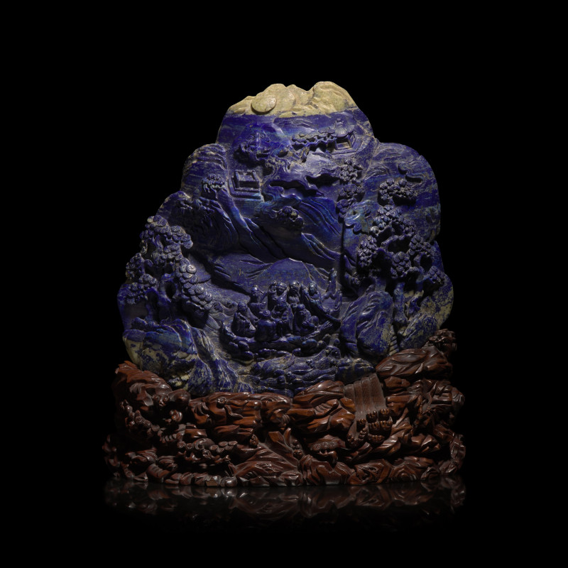 清 青金石雕羅漢渡江山子 | A Large Chinese Lapis Lazuli 'Eight Immortals Crossing the River' Boulder, Qing Dynasty