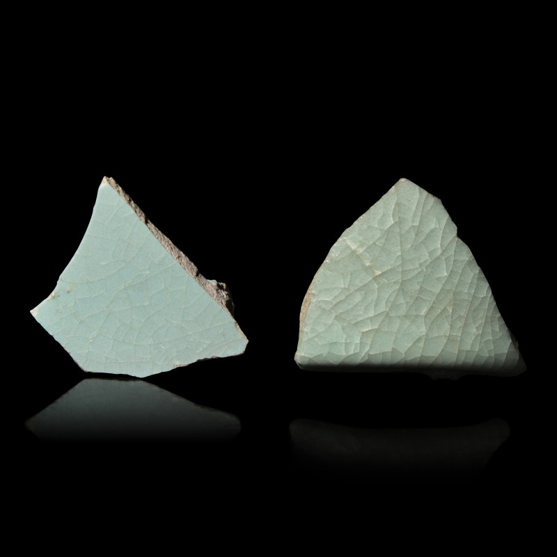 宋 汝窯及官窯帶支釘瓷片兩枚 | Two Chinese Celadon Glazed Ceramic Fragments, Song Dynasty