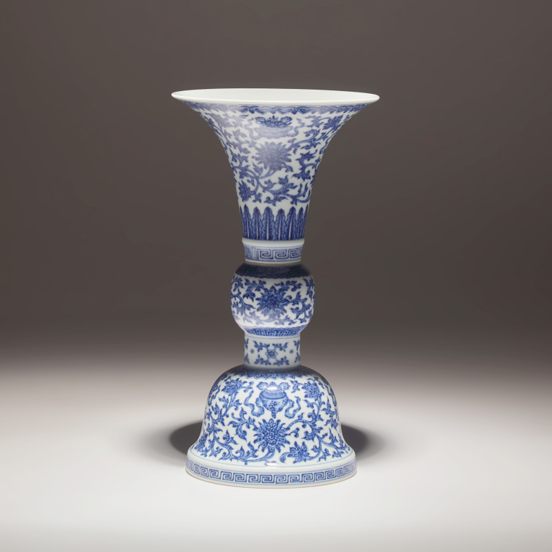 清嘉慶 青花纏枝蓮八吉祥花觚 | A Chinese Blue and White Porcelain Gu Vase, Jiaqing Mark and of the Period