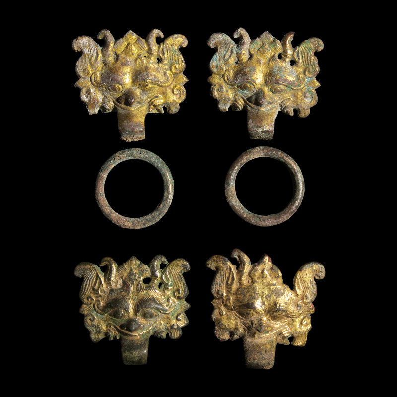漢-六朝 銅鎏金饕餮紋輔首兩對 | Two Pairs of Chinese Gilt Bronze 'Taotie Mask' Fittings, Han-Six Dynasties