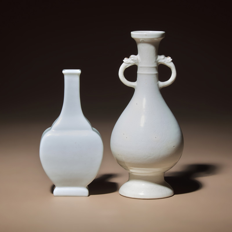 清 雙龍耳暗刻龍鳳紋白釉瓶及白釉四方小瓶 | Two Chinese White Glazed Porcelain Vases, Qing Dynasty