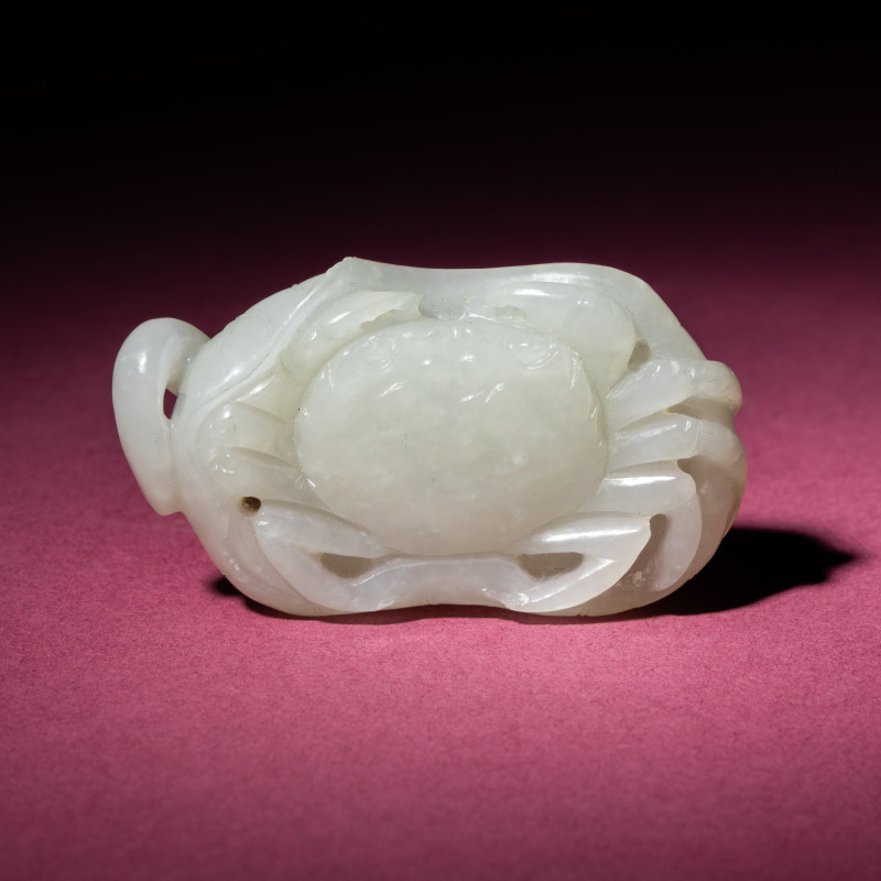 清中期 白玉蓮葉螃蟹把件 | A Chinese White Jade Carving of a Crab on Lotus Leaf, 18th/19th Century