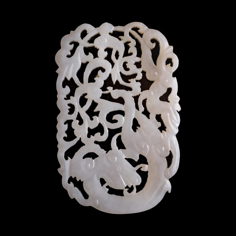 十八/十九世紀 白玉透雕螭龍佩 | A Chinese white jade openwork 'chilong' pendant, 18th/19th century - 图1