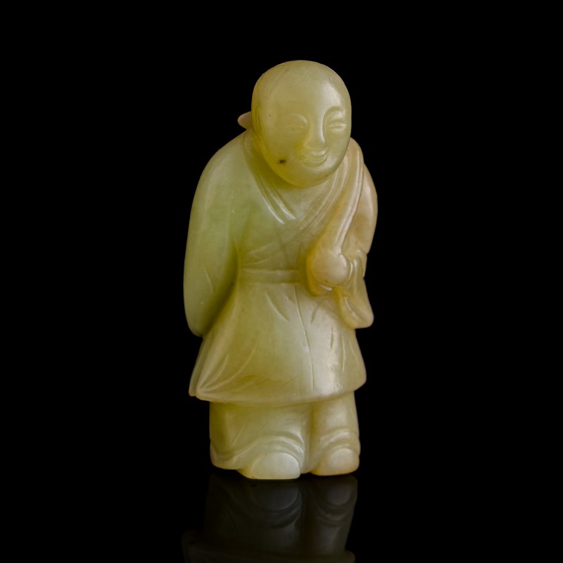 明代 黃玉童子 | A Chinese yellow jade carving of boy holding lotus, Ming dynasty - 图1