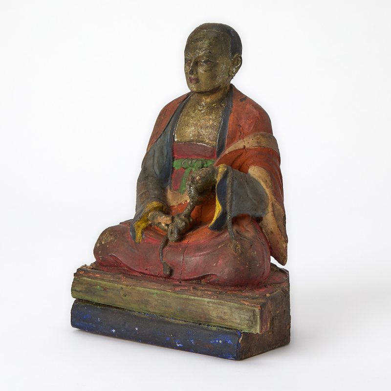 A Tibetan Polychrome Lacquered Wood Figure of a Monk - 图1