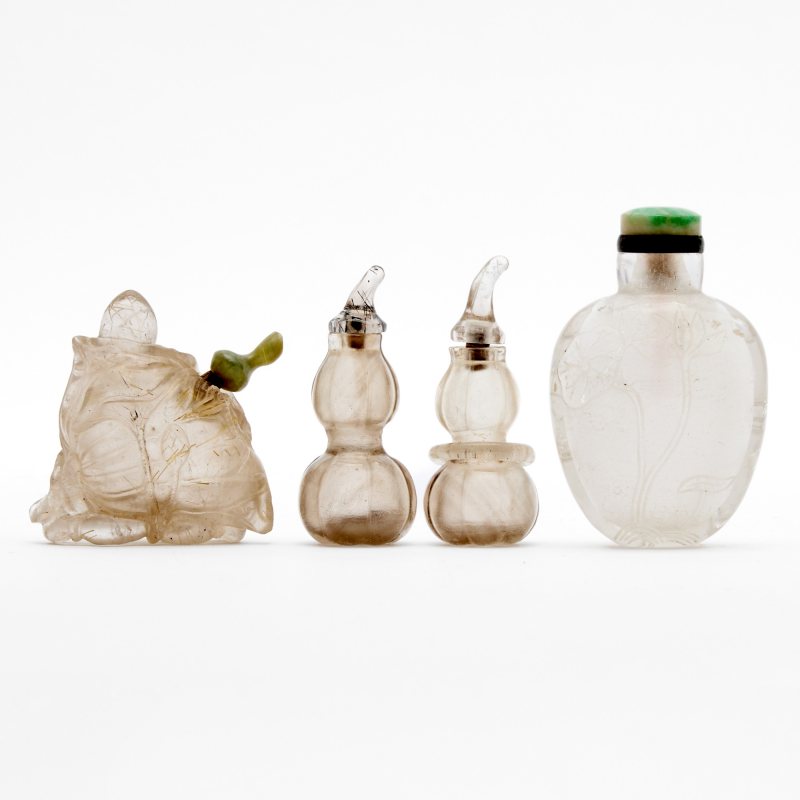 Four Chinese Carved Rock Crystal Snuff Bottles