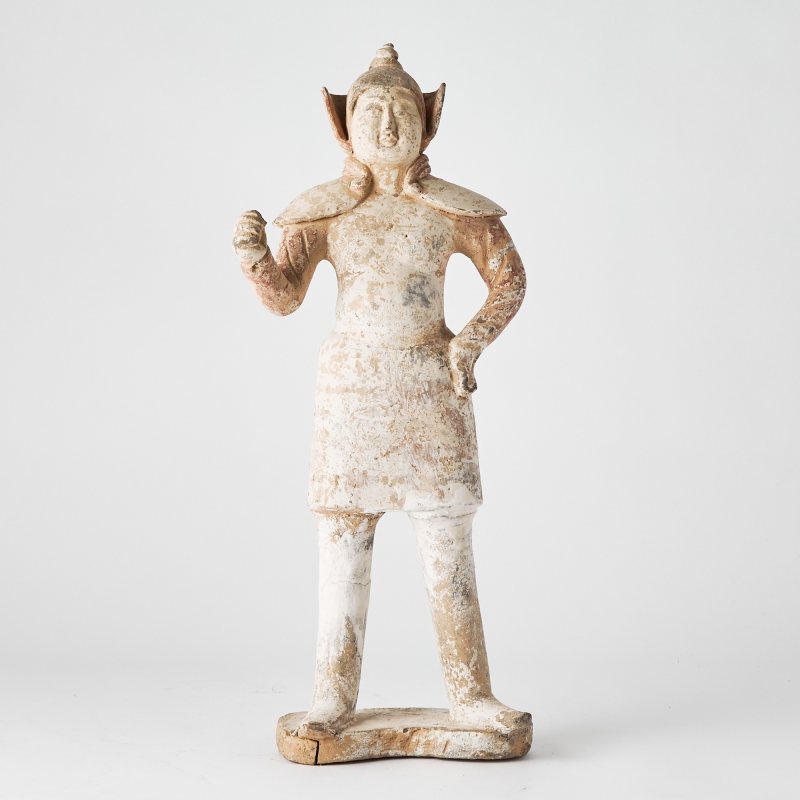 A Chinese Pottery Figure of a Soldier