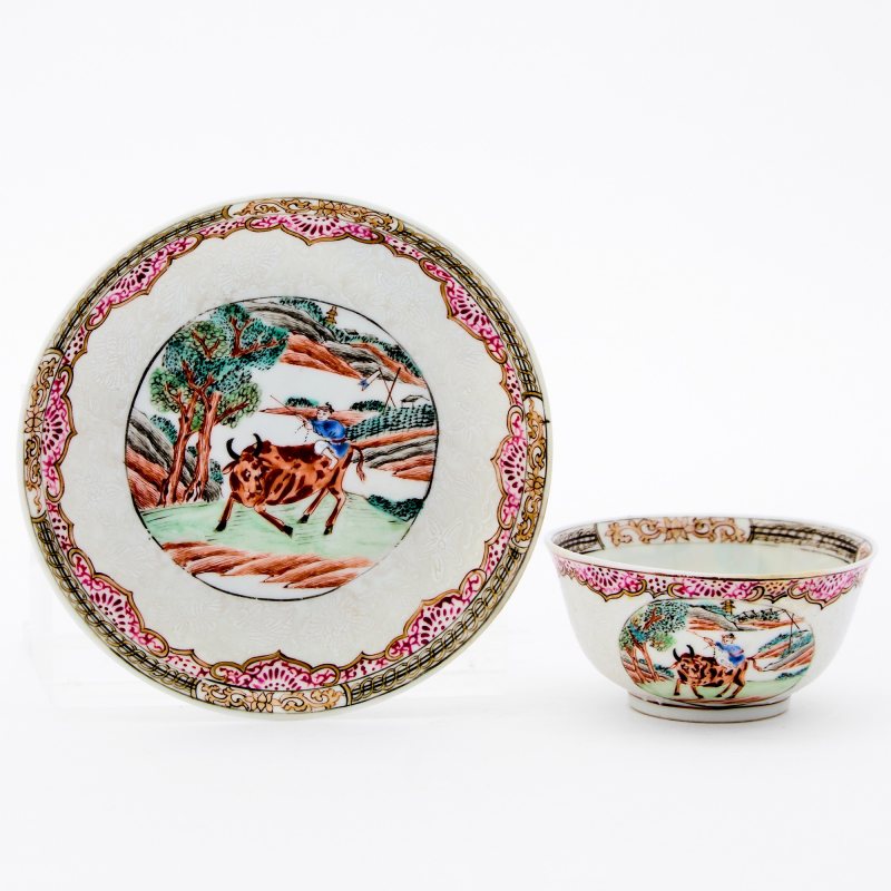 A Chinese Slip-Decorated Famille Rose Porcelain Saucer and Cup