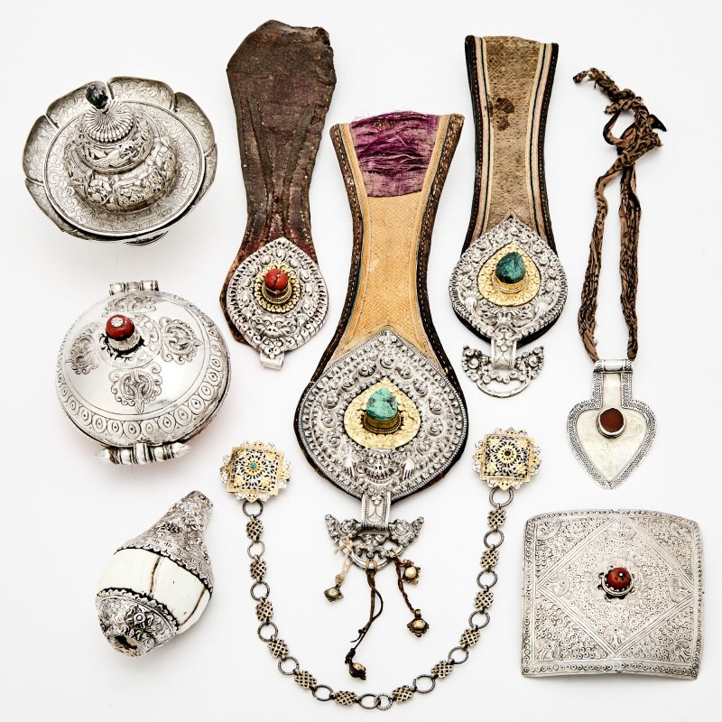 A Group of Tibetan Silver and Mixed Metal Ritual Objects
