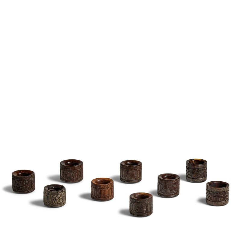 二十世紀 椰殼扳指一組九件 | A GROUP OF NINE COCONUT SHELL ARCHER'S RINGS - 图1