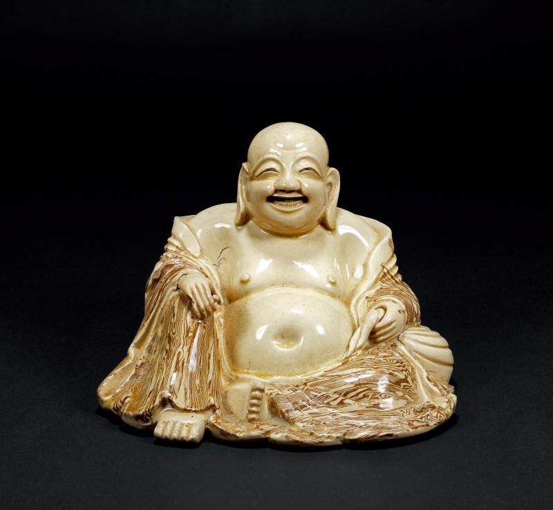 明 漳州窯絞胎米黃釉布袋和尚