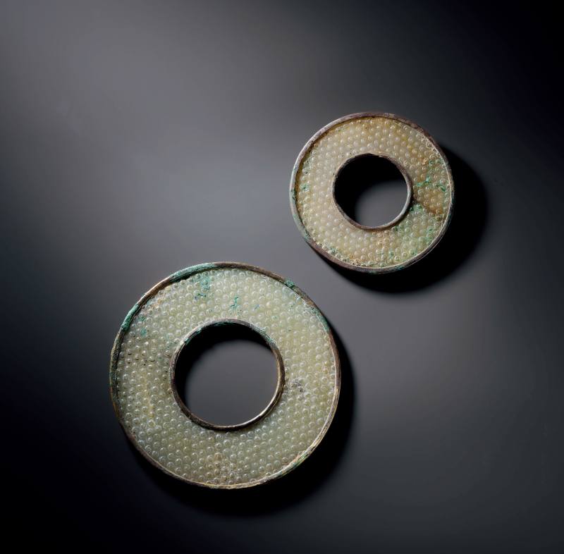 白玉銅鎏金鑲邊榖紋環和白玉銀鑲邊榖紋環各一件