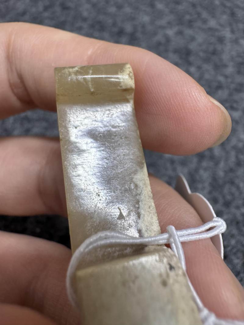 白玉受沁弦紋劍璏和玉榖紋劍璏各一件 - 图16