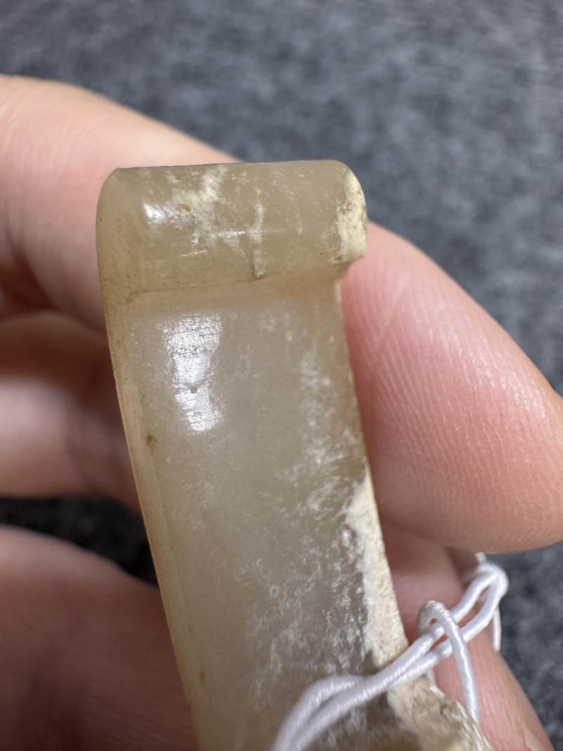 白玉受沁弦紋劍璏和玉榖紋劍璏各一件 - 图17