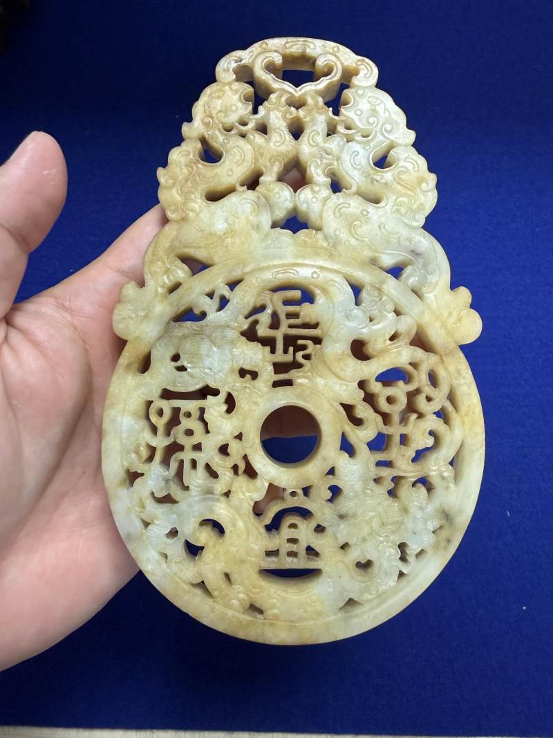 清乾隆 玉雕雙龍雙鳳「長宜子孫」出廓璧 - 图15