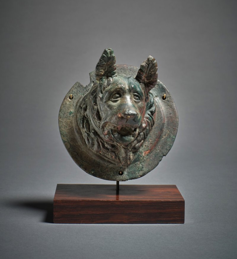 A Roman Bronze Roundel with a Relief Bust of a Molossian Hound, circa 1st/2nd century A.D.