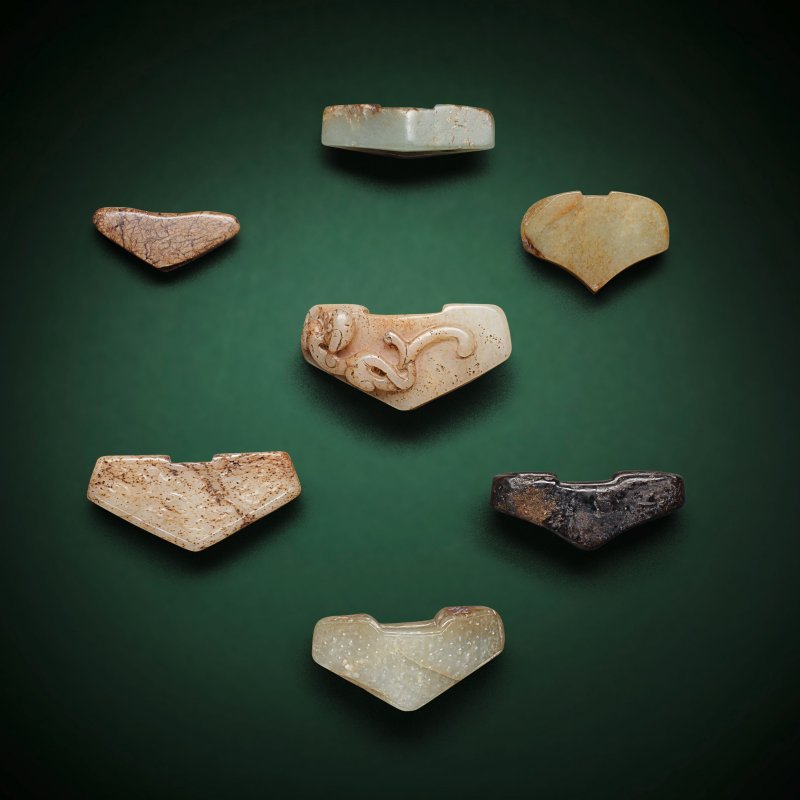 或漢及更晚 劍格一組七件 | A GROUP OF SEVEN JADE SWORD GUARDS