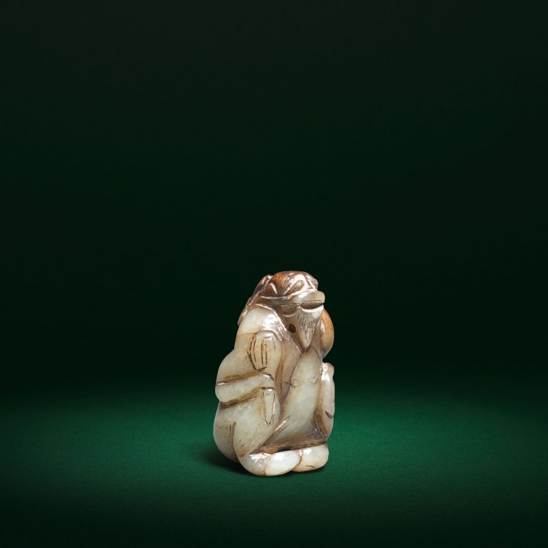 明或更晚 褐青玉鬼怪像 | A GREEN AND BROWN JADE CARVING OF A CROUCHING DEMON