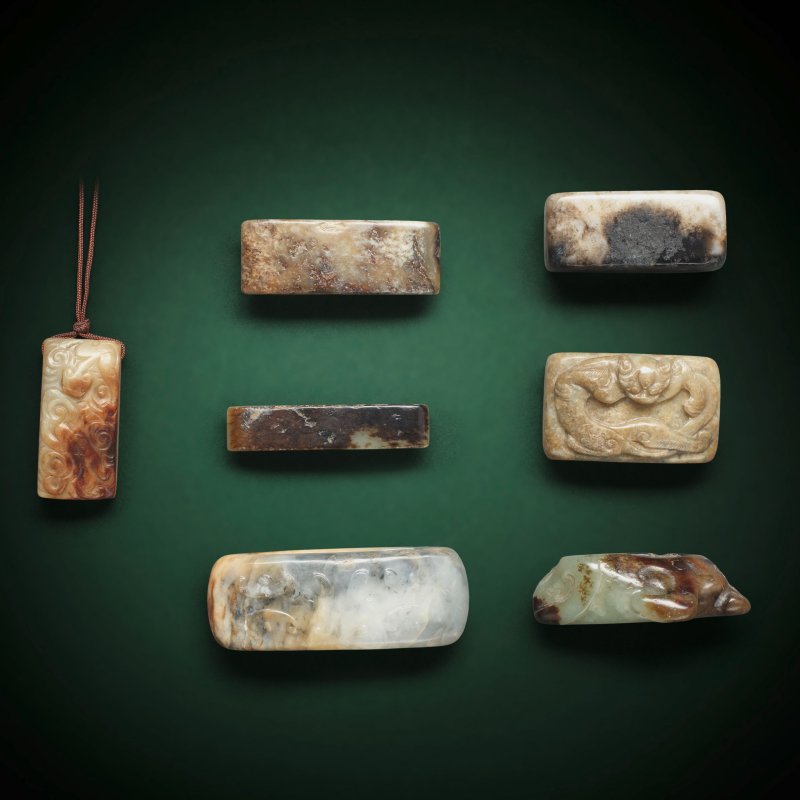 或宋及更晚 劍璏一組七件 | A GROUP OF SEVEN JADE SCABBARD SLIDES