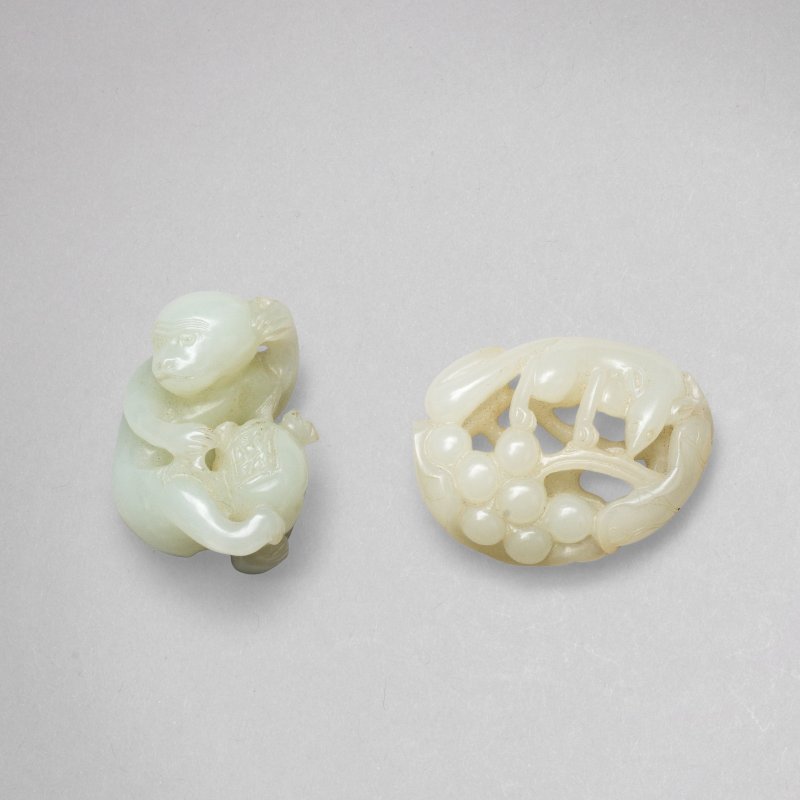 清 白玉靈猴及松鼠葡萄把件 一組兩件 | A WHITE JADE 'MONKEY' CARVING AND A WHITE JADE 'SQUIRREL AND GRAPE' CARVING
